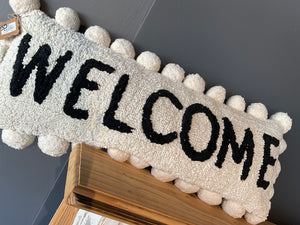 Pom Pom welcome pillow