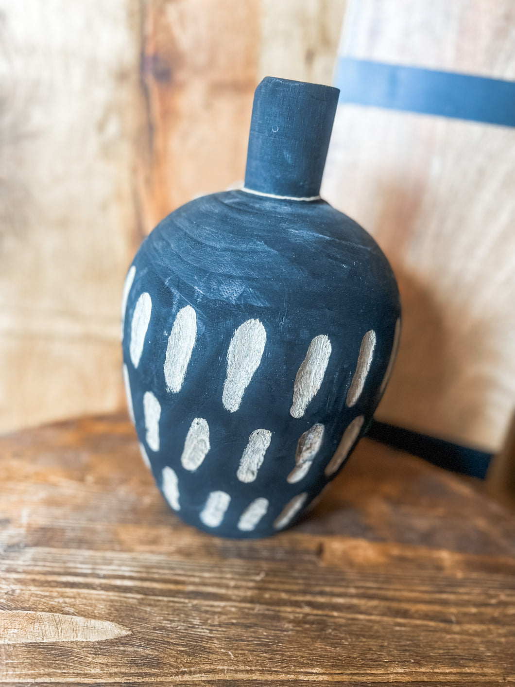 Black carved wood vase